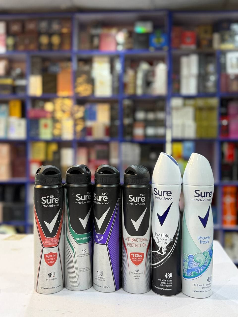 SURE SPRAY